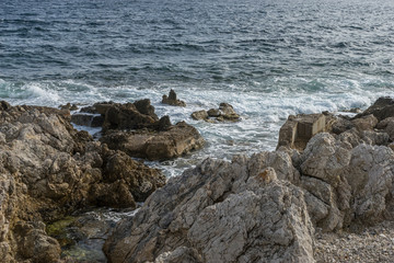 Tourism, Mediterranean sea crashing against the rocks of the Spanish island of Mallorca, Ibiza,...