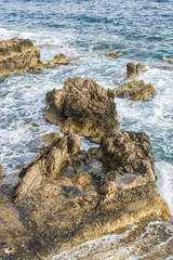 Tourism, Mediterranean sea crashing against the rocks of the Spanish island of Mallorca, Ibiza,...