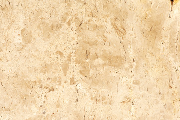 Golden marble texture of a natural white and golden stone tile.