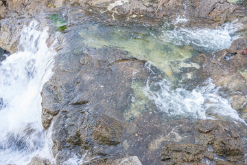 Tourism, Mediterranean sea crashing against the rocks of the Spanish island of Mallorca, Ibiza, Spain.