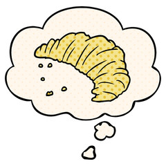 cartoon croissant and thought bubble in comic book style
