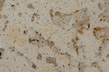 Golden marble texture of a natural white and golden stone tile.