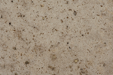 Golden marble texture of a natural white and golden stone tile.