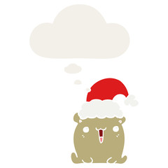 cute cartoon bear with christmas hat and thought bubble in retro style