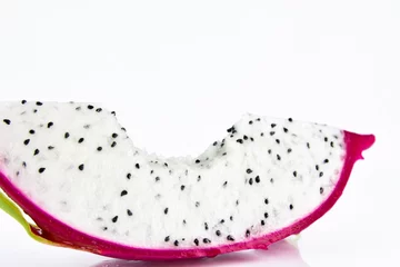 Tuinposter Close up the dragon fruit that is bitten on white background. Dragon fruit is popular as a fresh fruit.Is a mixture of fruit salad or blended into juice. © Chaimongkol