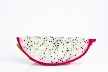 Close up the sliced dragon fruit on white background. Dragon fruit is popular as a fresh fruit.Is a mixture of fruit salad or blended into juice.