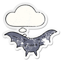 cartoon bat and thought bubble as a distressed worn sticker