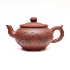 Clay Chinese teapot isolated on white