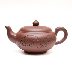 Clay Chinese teapot isolated on white