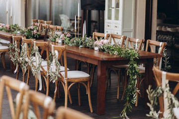 Boho wedding chair with eco decor for guests.