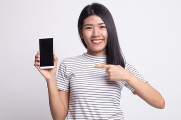 Young Asian woman point to mobile phone.