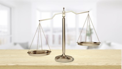 Justice Scales and books and wooden gavel