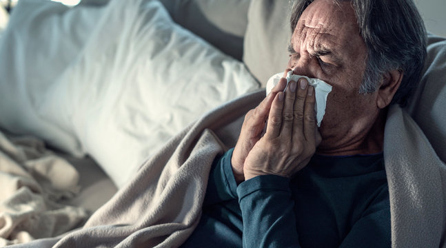 Senior man suffering from cold