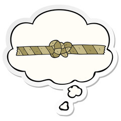cartoon knotted rope and thought bubble as a printed sticker