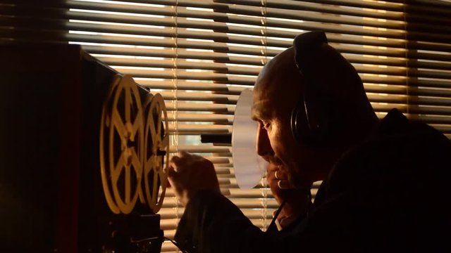 FBI secret agent listens and records the conversation on the tape, the microphone is aimed at people