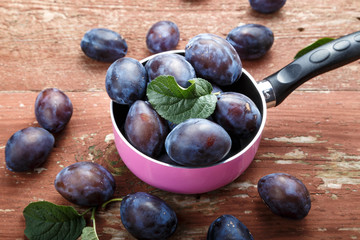 harvest of ripe plums