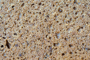The cut of rye bread baked according to the classic recipe close-up