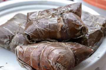 traditional tamales, wrapped in banana leaf valladolid, mexico