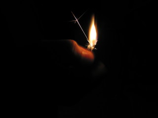 burning on black background