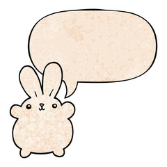 cute cartoon rabbit and speech bubble in retro texture style