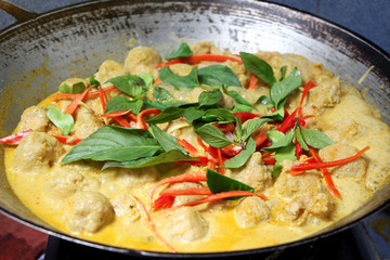 Green curry pork meatball in an old pan, Thai food style, Asian food concept