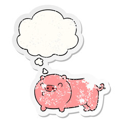 cartoon pig and thought bubble as a distressed worn sticker
