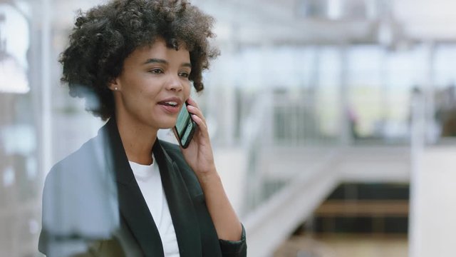 business woman using smartphone having phone call chatting on mobile phone enjoying conversation with client at work in office