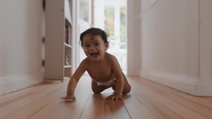 happy baby girl crawling on floor toddler exploring home curious infant having fun enjoying childhood - Powered by Adobe
