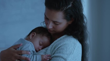 mother holding sleeping baby calming tired newborn gently soothing infant nurturing child loving mom enjoying motherhood - Powered by Adobe