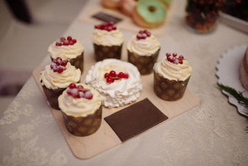 Sweet dessert table at a wedding.Cakestand at a wedding