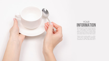 White saucer cup in hand, sample text on white background isolation