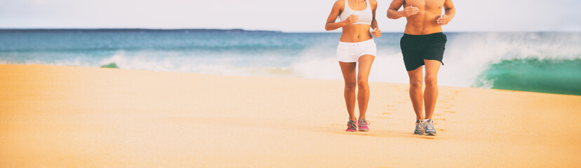 Sports athletes runners couple training together jogging on beack banner background panoramic with...