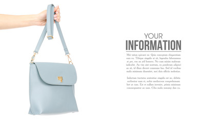 Woman's female blue leather bag in hand, sample text on white background isolation