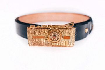 leather belt with a buckle on white, clipping path included. Metal buckle in the form of a retro...
