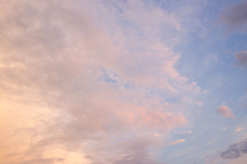 the sky with gentle clouds of pink shade, colored by the setting sun.