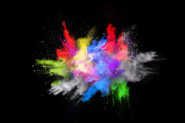 abstract colored dust explosion on a black background.abstract powder splatted background,Freeze motion of color powder exploding/throwing color powder, multicolored glitter texture.