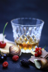 a glass of crystal with whiskey