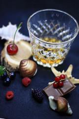 a glass of crystal with whiskey
