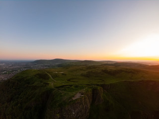 Colorful sunset at Cave Hill Country Park Belfast, Northern Ireland. Aerial view on City and hills 