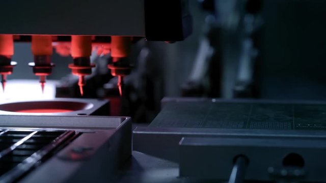 Electronic circuit board production. Automated Circut Board machine Produces Printed digital electronic board. Electronics contract manufacturing. Manufacture of electronic chips. High-tech.