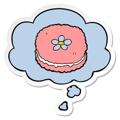 cartoon biscuit and thought bubble as a printed sticker
