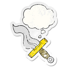 cartoon dagger and thought bubble as a distressed worn sticker