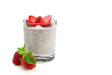 Chia pudding with strawberry and mint on a white background. Space for text or design.