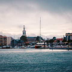 Naklejka premium View of the harbor of Arcachon from the see. The Saint-Ferdinand church dominate the city.