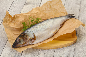 Salted herring over the wooden board