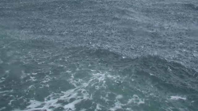 Heavy rain on the sea surface, close-up.