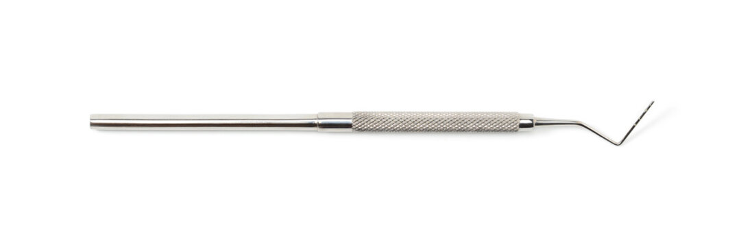 Dentist equipment: Diagnostic single-ended periodontal probe, stainless steel explorer. Dental tool isolated on white background, macro closeup.