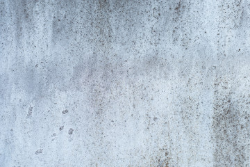 Fototapeta premium Rusty metal texture with scratches and cracks. paint traces. Blue, white and grey colors. Copy space