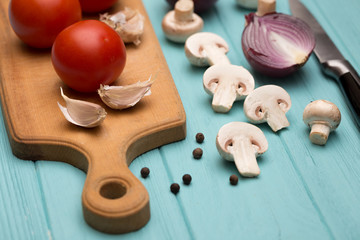 tomatoes on a cutting board