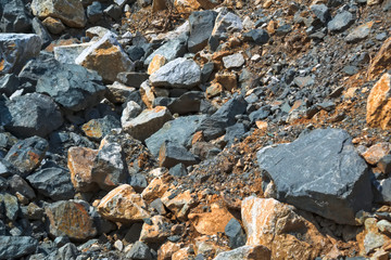 The texture of large stones in a quarry for the extraction of stone.
